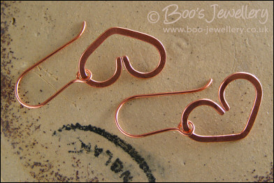 Hammered heart earrings in copper