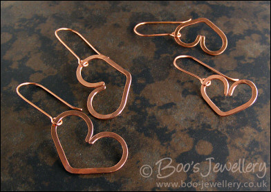 Hammered heart earrings in copper