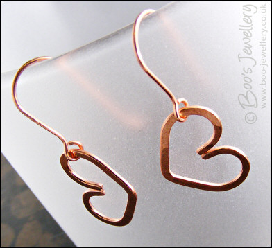 Hammered heart earrings in copper