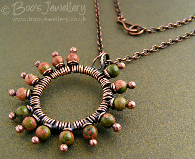 Antiqued copper and unakite pendant on chain - oops price!