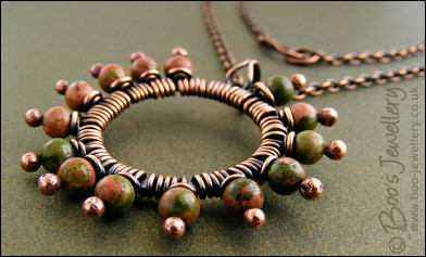Antiqued copper and unakite pendant on chain - oops price!