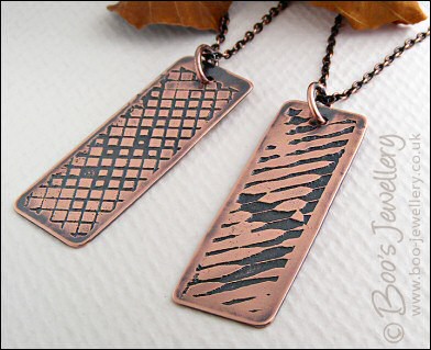 Abstract design etched copper pendant on chain