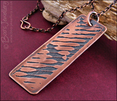 Abstract design etched copper pendant on chain