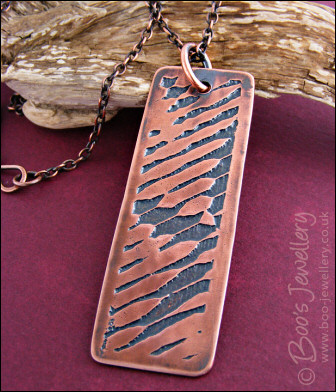 Abstract design etched copper pendant on chain