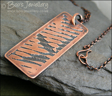 Abstract design etched copper pendant on chain