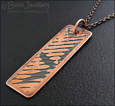 Abstract design etched copper pendant on chain