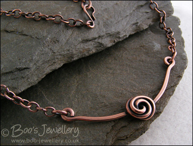 Rosebud knot antiqued copper necklace