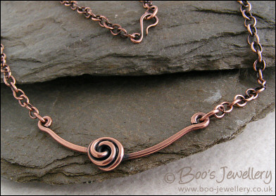 Rosebud knot antiqued copper necklace