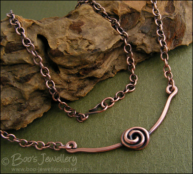 Rosebud knot antiqued copper necklace