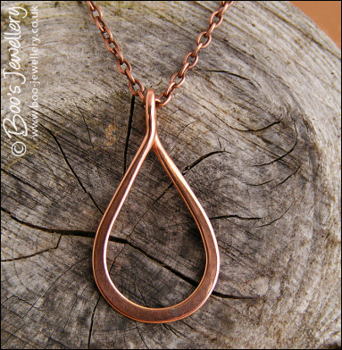 Polished copper teardrop loop pendant