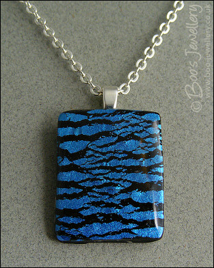Faux dichroic style polymer clay pendant
