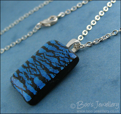 Faux dichroic style polymer clay pendant
