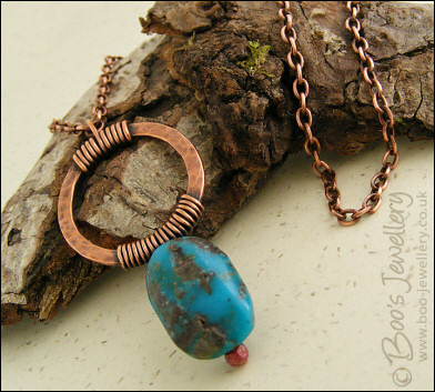 Antiqued copper pendant with turquoise nugget - oops price!