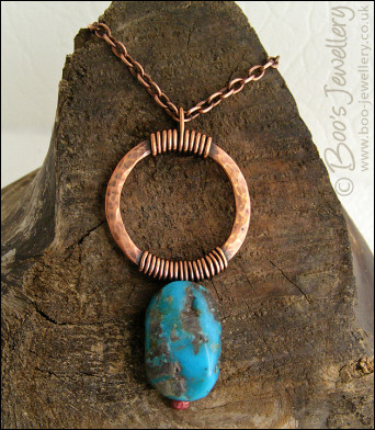 Antiqued copper pendant with turquoise nugget - oops price!