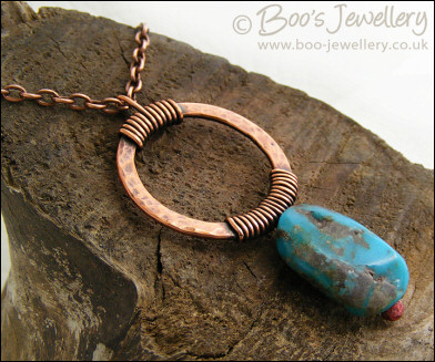 Antiqued copper pendant with turquoise nugget - oops price!