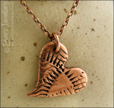Antiqued copper curly textured heart pendant necklace