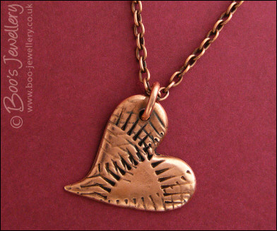 Antiqued copper curly textured heart pendant necklace