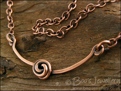 Rosebud knot antiqued copper necklace