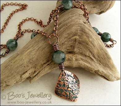 Copper and green jade necklace and earring set with crackled charms
