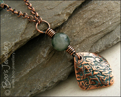 Copper and green jade necklace and earring set with crackled charms