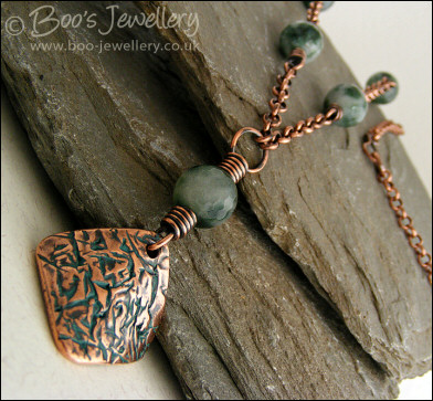 Copper and green jade necklace and earring set with crackled charms