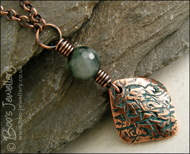 Copper and green jade necklace and earring set with crackled charms