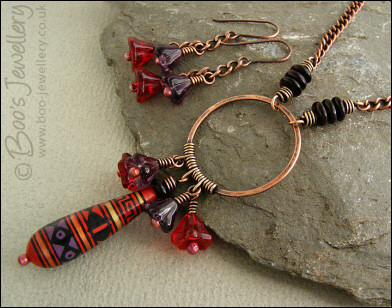 Purple and red necklace and earring set with hand made ceramic bead