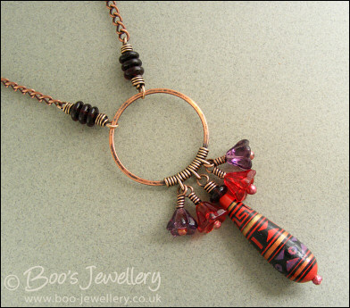 Purple and red necklace and earring set with hand made ceramic bead