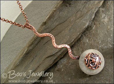 Copper and moonstone long drop squiggle pendant