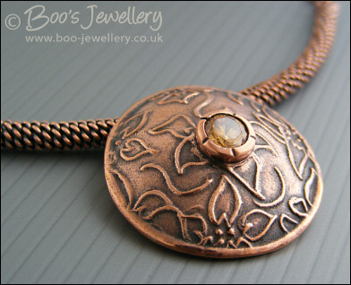 Domed pendant with champagne CZ stone on rope necklace