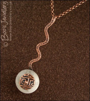 Copper and moonstone long drop squiggle pendant