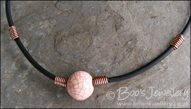 Ceramic bead, copper coils and black necklace