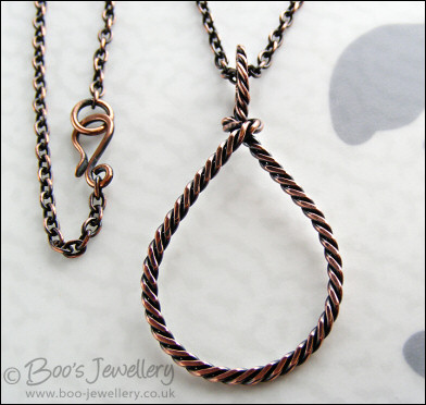 Antiqued copper knotted rope loop pendant on chain