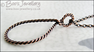 Antiqued copper knotted rope loop pendant on chain