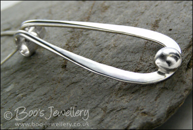 Sterling silver teardrop pendant with pebble of silver