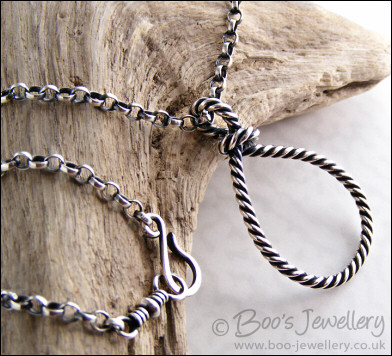 Twisted Sterling silver knotted loop pendant