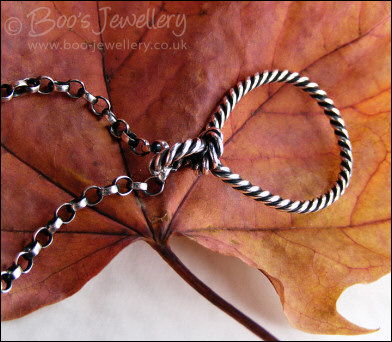 Twisted Sterling silver knotted loop pendant