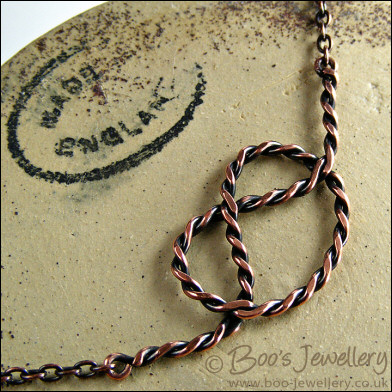 Twisted antiqued copper knot necklace