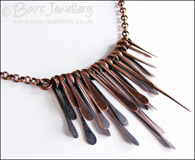 Hammered and antiqued copper paddles necklace