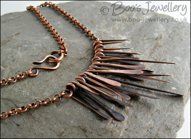 Hammered and antiqued copper paddles necklace
