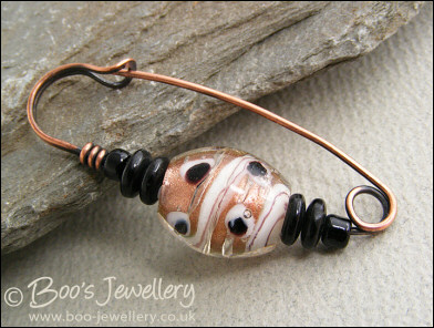Gold, white and black copper kilt pin