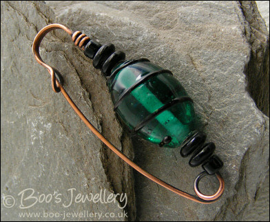 Green and black antiqued copper kilt pin